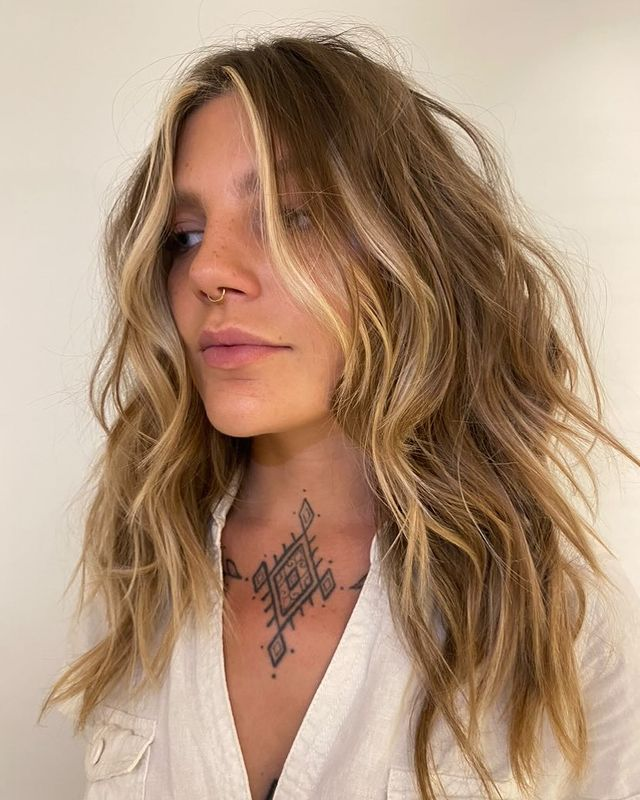 1. Textured Shaggy Wolf cut Layers by @colourbyjackson on ig. For a truly rock-and-roll take wolfcut, consider incorporating textured shaggy layers.