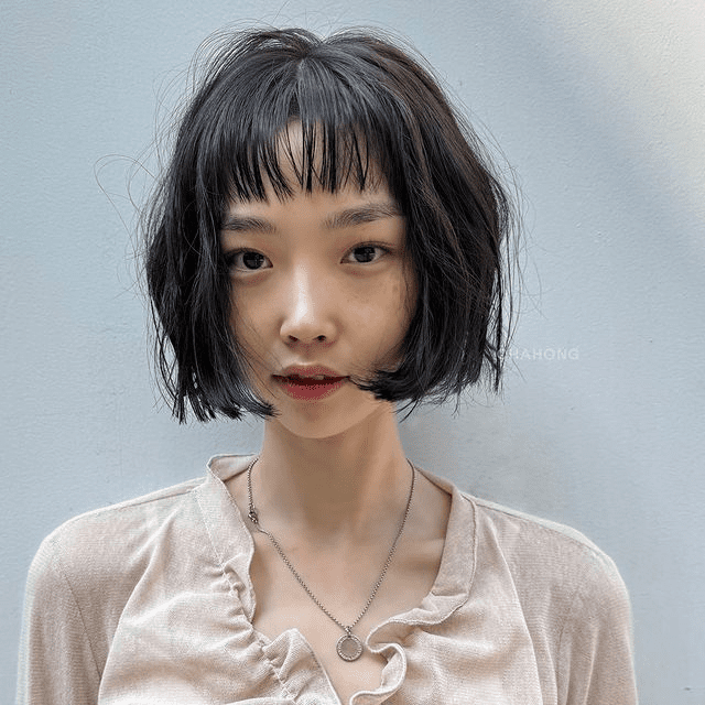 15. Bob Cut with See-Through Bangs by @chahong_official. Click here for more trendy Korean haircuts!