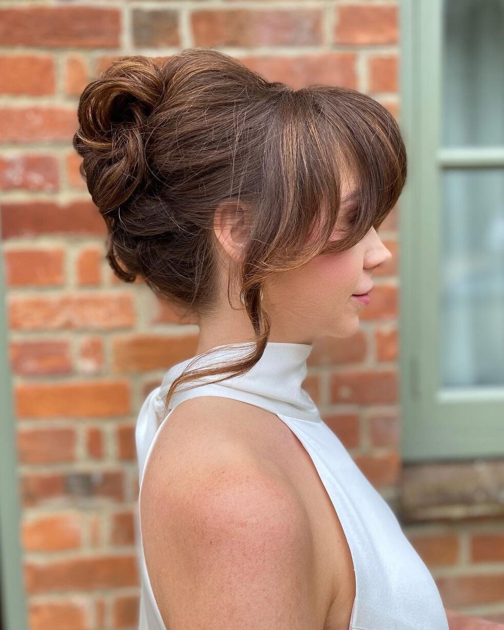 9. 60's Beehive Updo by @oxfordshireweddinghair. sCheck out 20+ more updos for long hair!