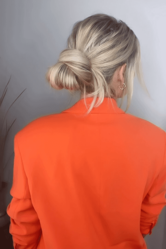 8. Twisted Knot Low Bun by  @jamielvandenberg. Check out 20+ more updos for long hair!