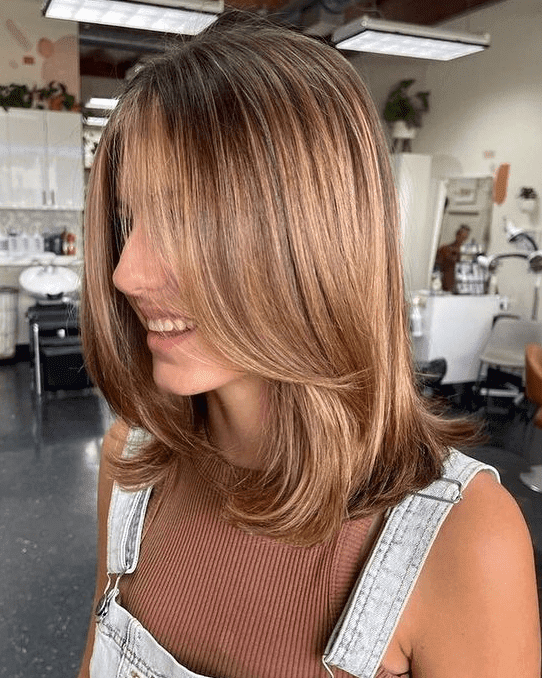 Medium Summer Haircuts: 11. Layered Lob by @cherishinghair. Click here for more summer haircut ideas!