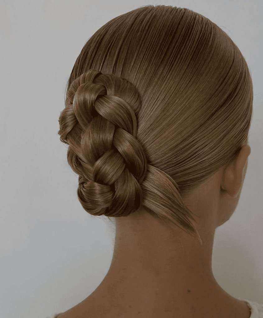 1. The Braided Ballerina Bun by @sunniebrook. Check out 20+ more updos for long hair!