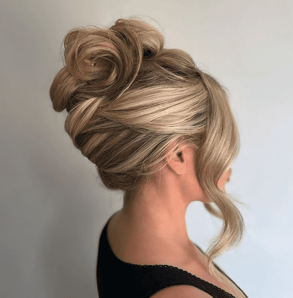 13. Romantic French Twist Updo by @sadies_hairandspmu. Check out 20+ more updos for long hair!