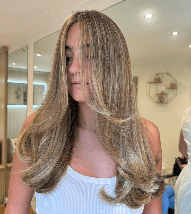 face-framing layered haircut for blonde hair
